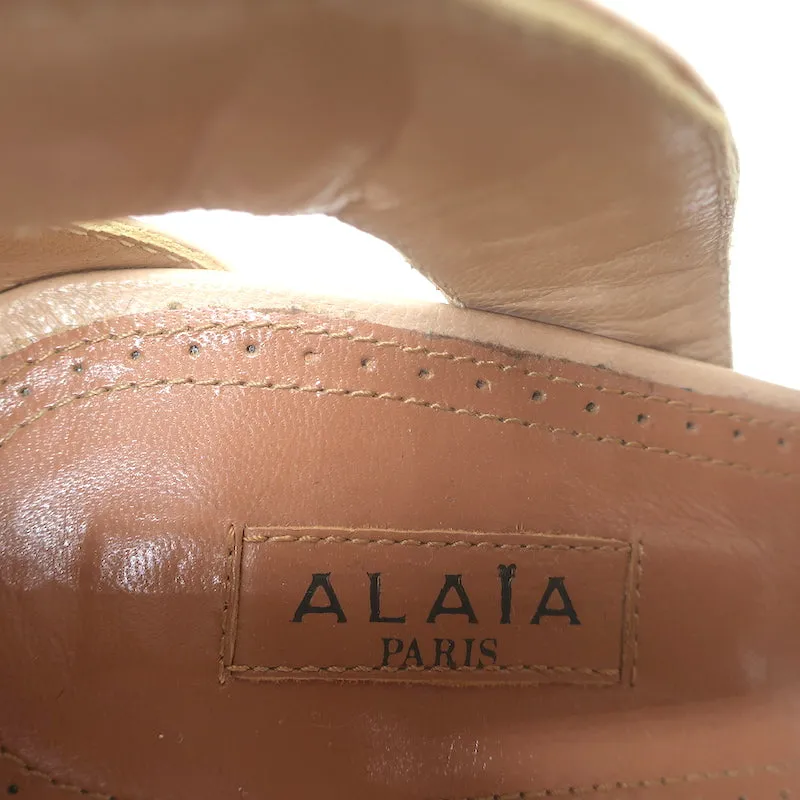 Bottines Alaia à lacets avec découpes en cuir nude taille 38.5 à bout ouvert