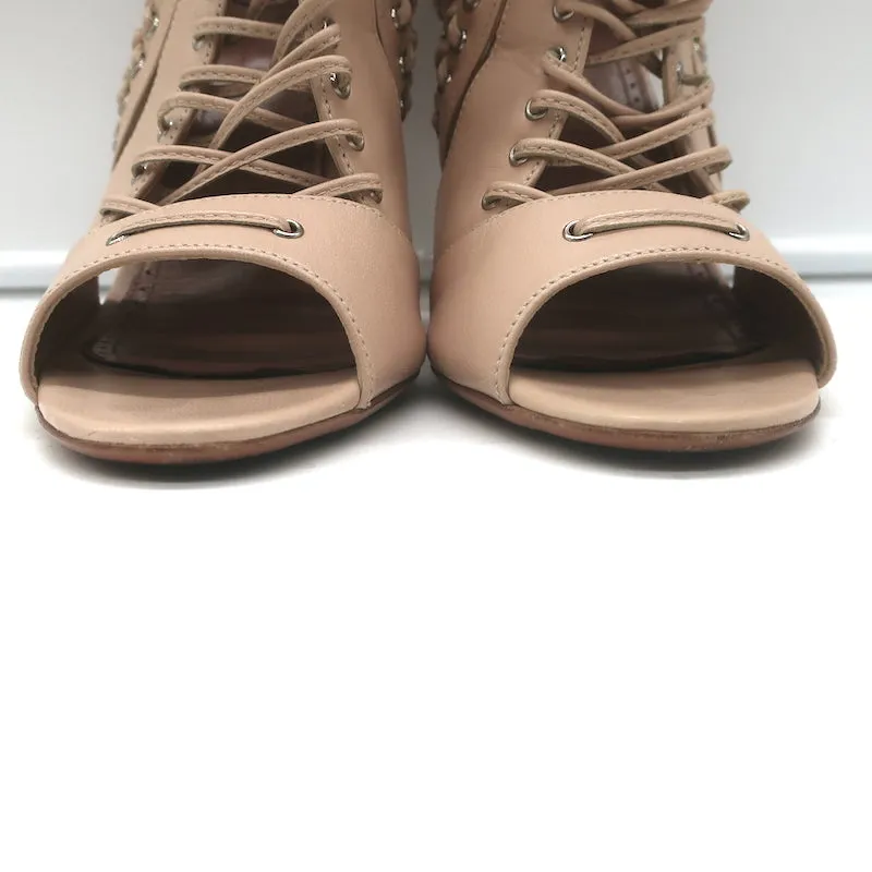 Bottines Alaia à lacets avec découpes en cuir nude taille 38.5 à bout ouvert