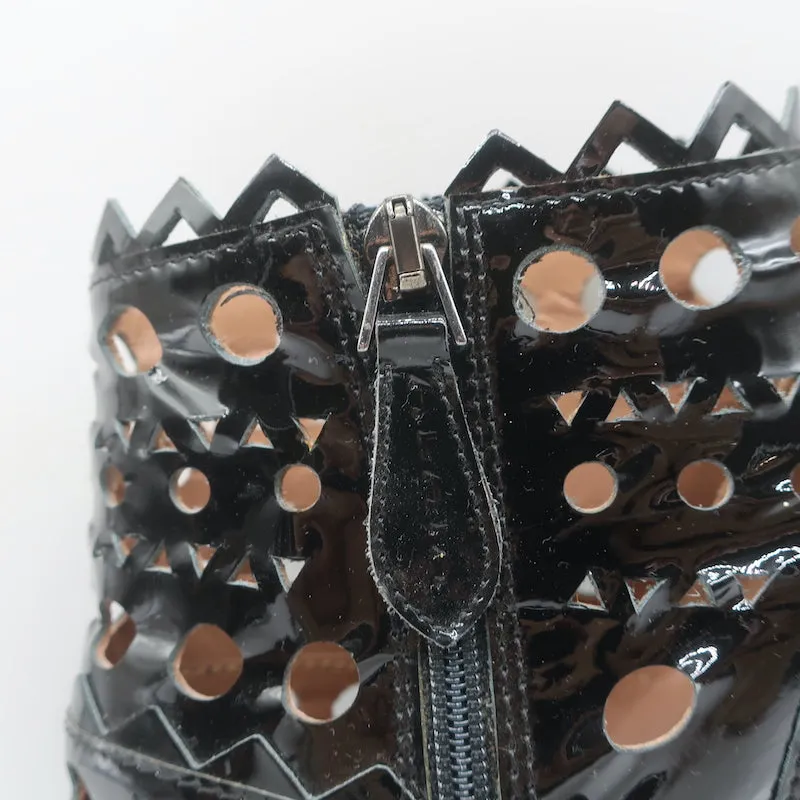 Bottes cheville Alaia en cuir vernis noir à découpes laser Taille 38.5 Bottines à talon haut