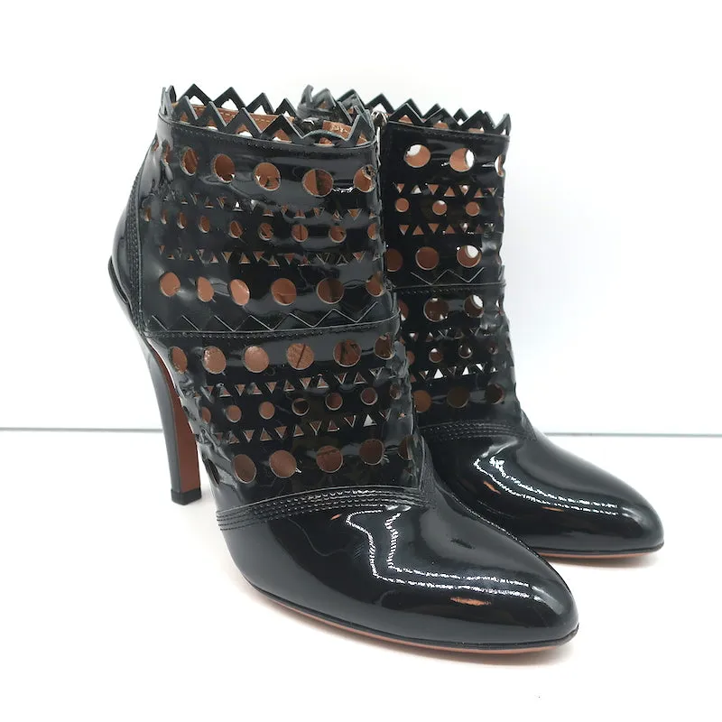Bottes cheville Alaia en cuir vernis noir à découpes laser Taille 38.5 Bottines à talon haut