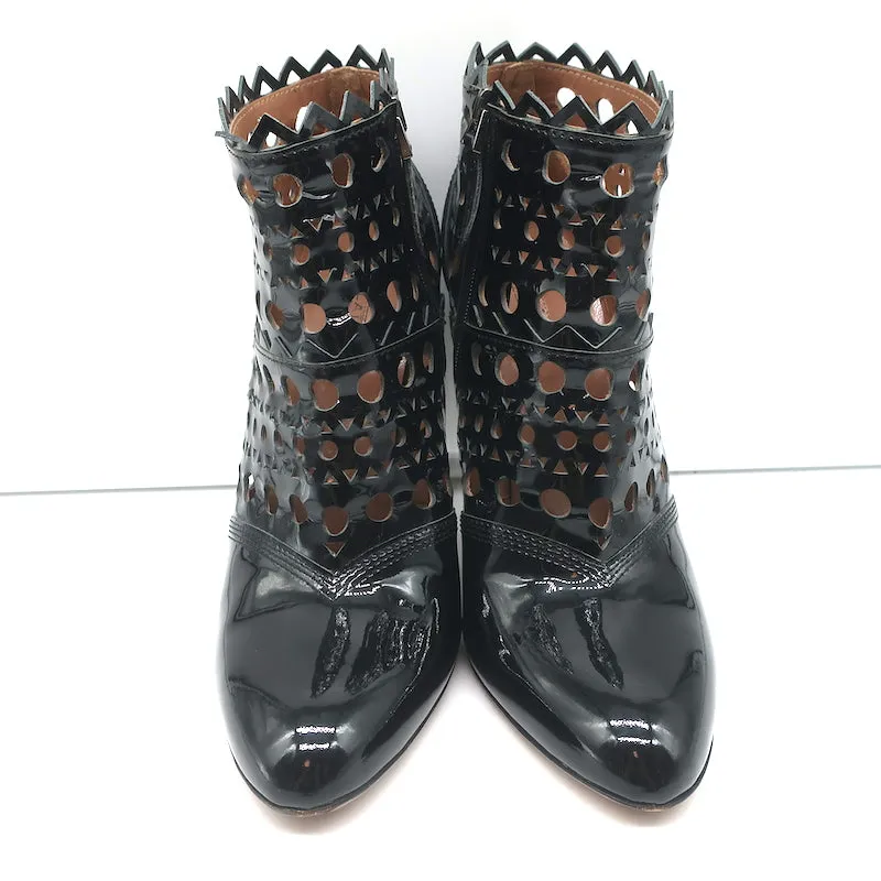 Bottes cheville Alaia en cuir vernis noir à découpes laser Taille 38.5 Bottines à talon haut