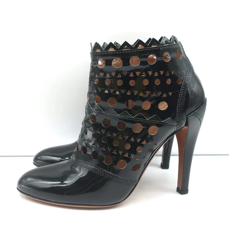 Bottes cheville Alaia en cuir vernis noir à découpes laser Taille 38.5 Bottines à talon haut