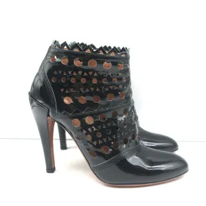 Bottes cheville Alaia en cuir vernis noir à découpes laser Taille 38.5 Bottines à talon haut