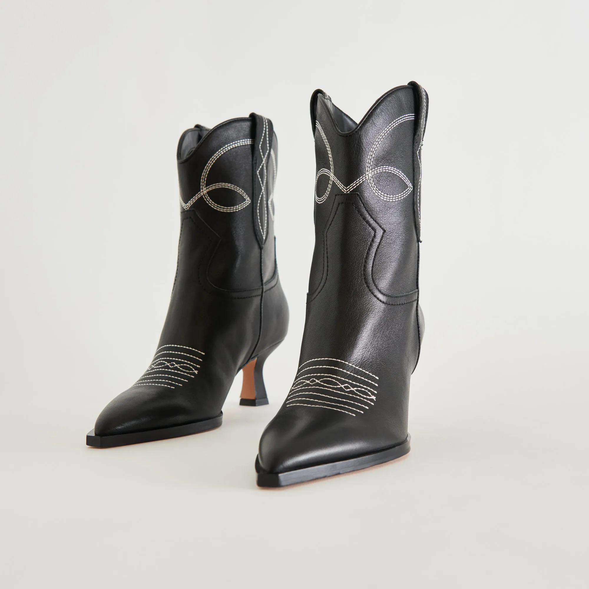 BOTTILLONS ANGEL NOIR ET BLANC EN CUIR